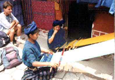 Mother and daughter weaving