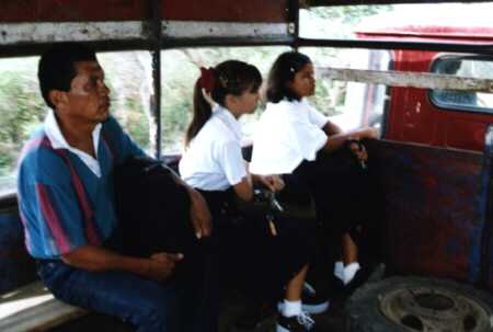 Schoolgirls in back of truck