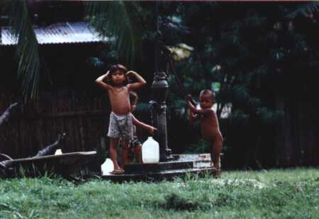 Children pumping water