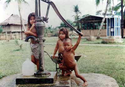 Children pumping water