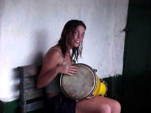 Naamara playing the drums.