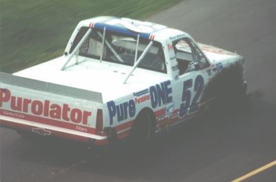 NASCAR truck with a blown  tyre